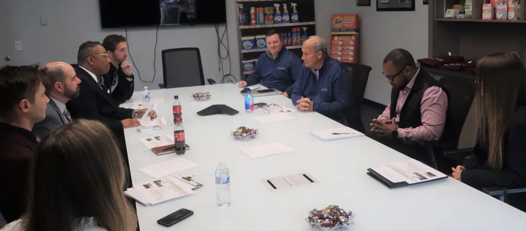 Representatives from Jeff Ruby's meet with leaders from Nehemiah Manufacturing and Cincinnati Works